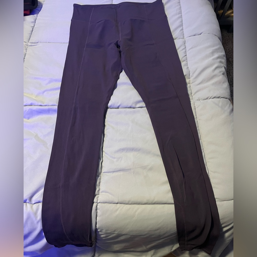 Athleta long ballet style leggings in Eggplant color.